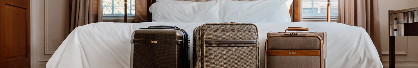 Banner image is a mix of hardside and softside carry-on spinners. 