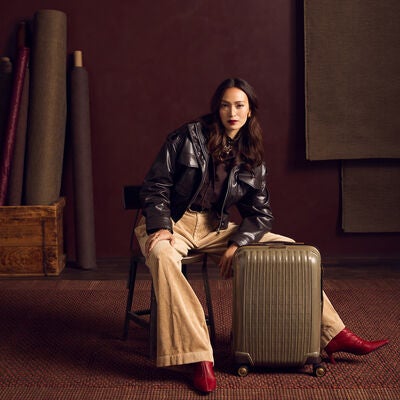 Tweed CURV&reg; Global Carry-On in the color Tweed/Natural Leather.